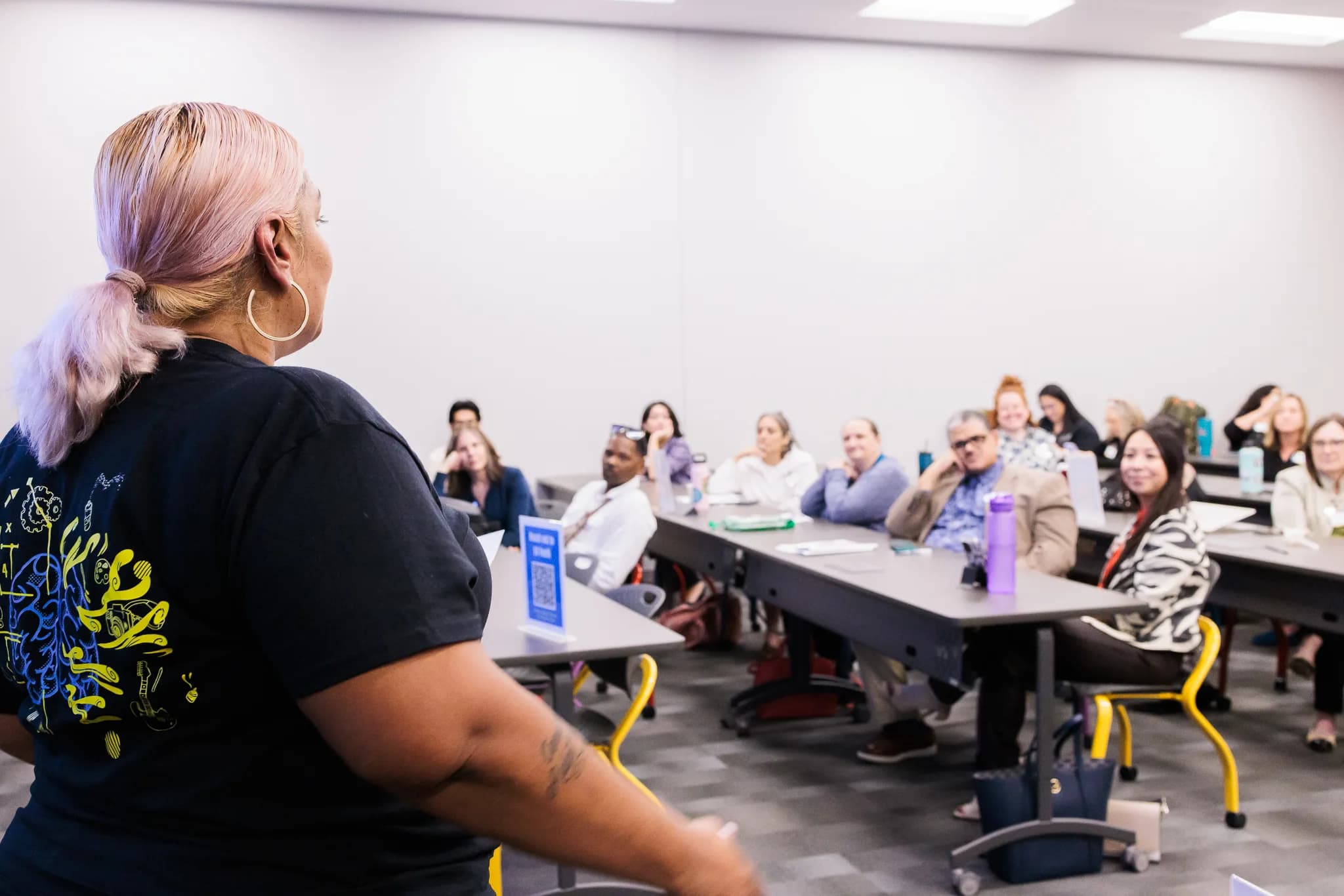 Diverse community members participating in a public engagement event in Austin