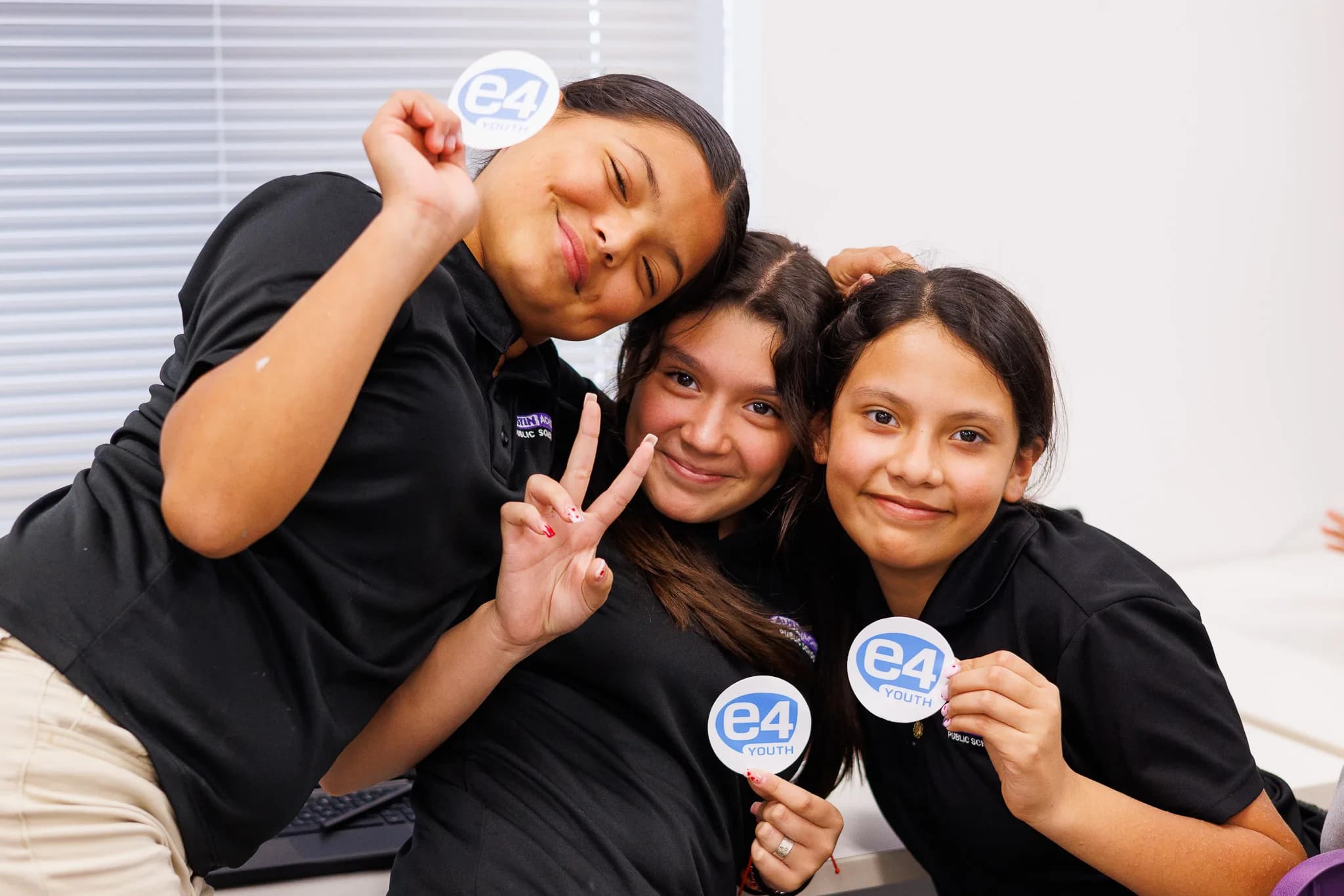 Young creative professional presenting portfolio work at a showcase