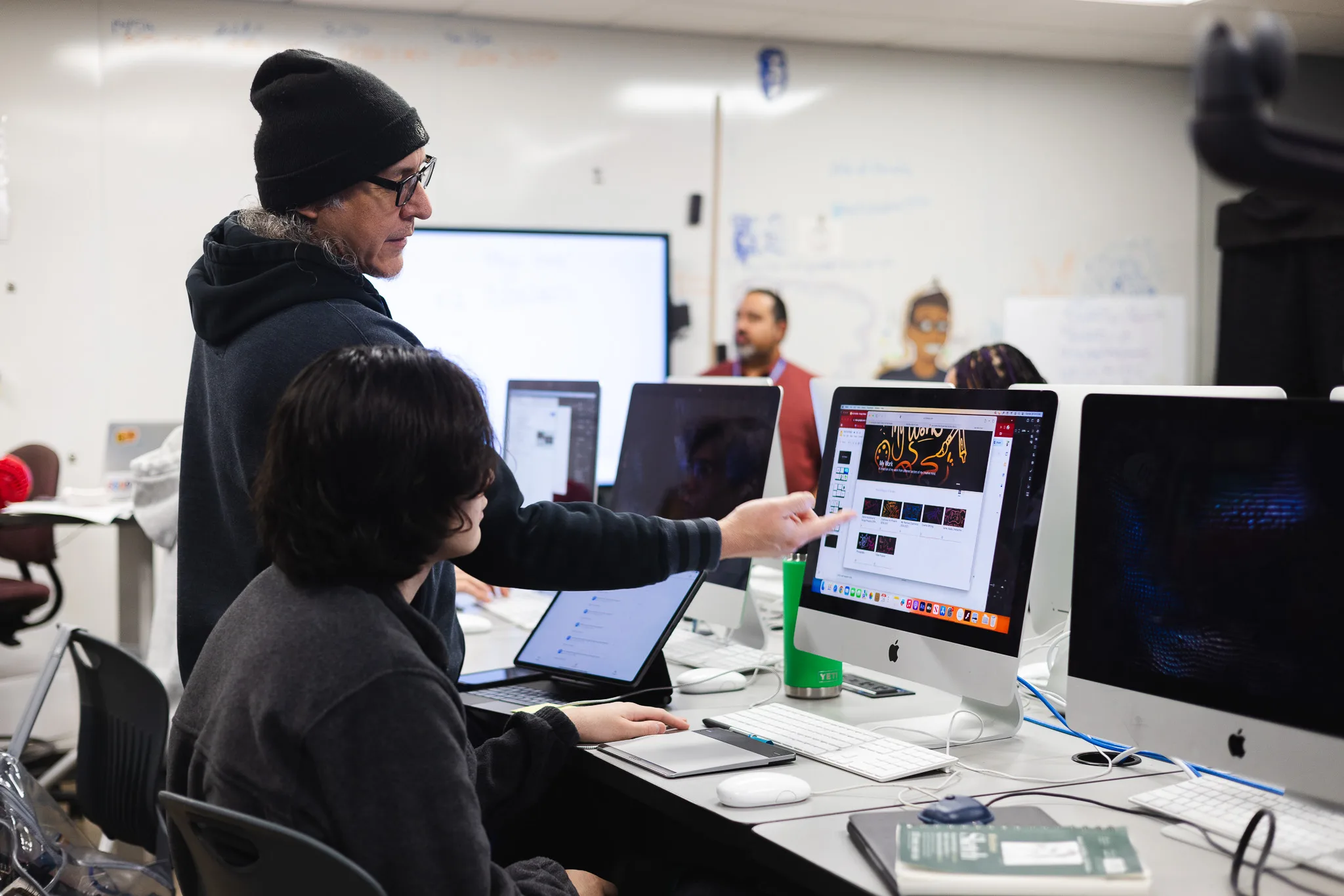 Students collaborating on a digital storytelling project